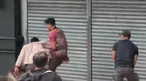 Screen grab from the viral video on the apprehension of a minor ambulant vendor whom Baguio netizens see as too harsh. Aldwin Quitasol