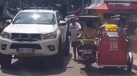 THE viral driver is shown on a screengrab as he berates the tricycle operator during a road scuffle.