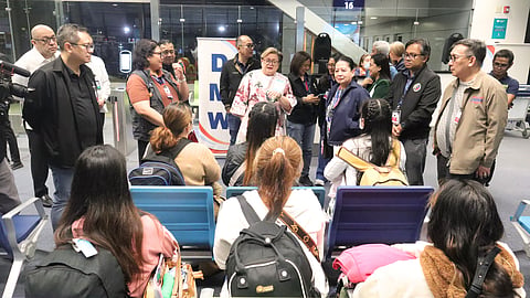 DFA officials welcome the first batch of Filipinos freed by Russia.