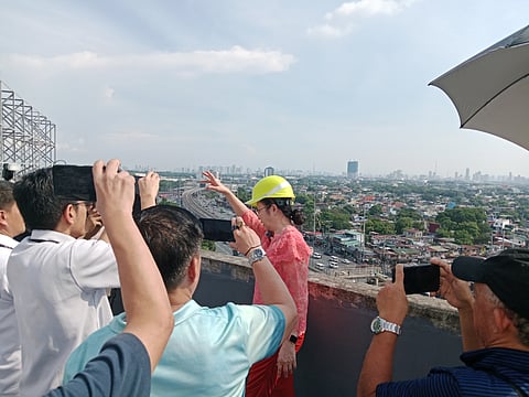 PAO Chief Persida Rueda-Acosta inspects the new eight storey office building under construction. (Photo Alvin Murcia)