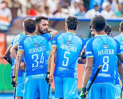 Indian captain Harmanpreet Singh scores twice as India defeat Japan 3-2 to enter the Super 4s of the Asia Cup.
