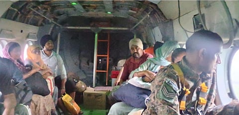 Indian Air Force and Army personnel carry out evacuation and deliver essential relief in flood-hit areas of Punjab and Jammu.