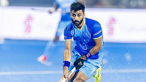 Manpreet Singh playing hockey