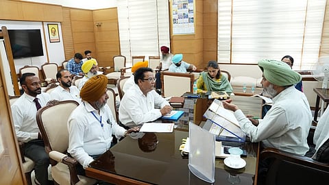 Finance minister in a meetings to resolve employee union grievances