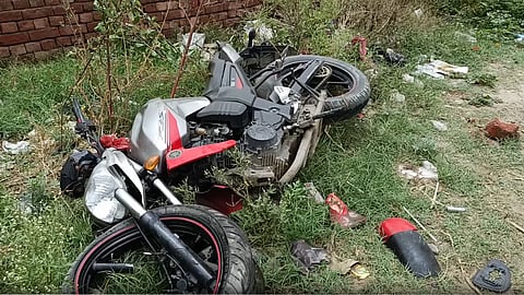 Victim's crushed motorcycle