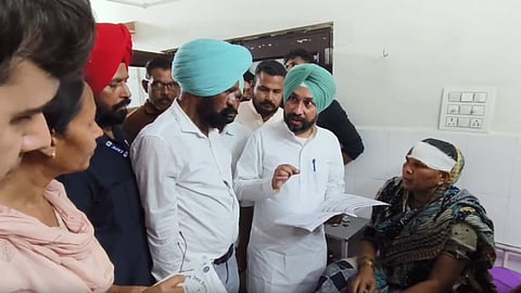 Officials meeting injured sanitation workers
