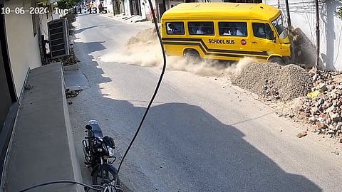 School bus hits electricity pole