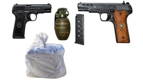 Seized arms and heroin