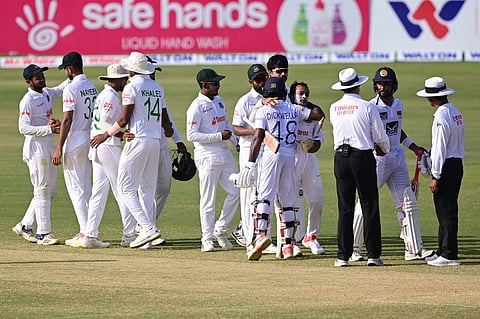 Karunaratne, Dickwella help Sri Lanka draw first Test against Bangladesh