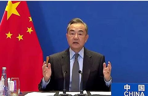 Chinese FM says Taiwan will eventually return to 'embracing the motherland'