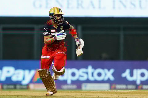 IPL 2022: Kohli blitz takes Bangalore to fourth place with 8-wicket win over Gujarat (ld)
