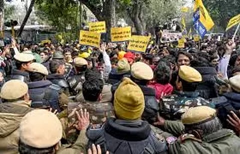 MinisterHarjot Bains injured in AAP's paddy protest as police use water cannons