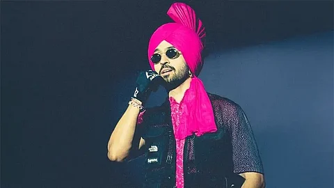 Diljit Dosanjh notices fans watching Ahmedabad show from hotel balcony without tickets, pauses show