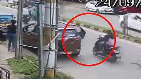 Bengaluru: Women rider run over by a car after colliding with parked SUV door in a terrifying viral video: Watch