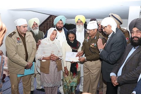 On directions of cm bhagwant mann, adgp law & order hands over rs 2 crore cheques to family of slain constable mandeep singh
