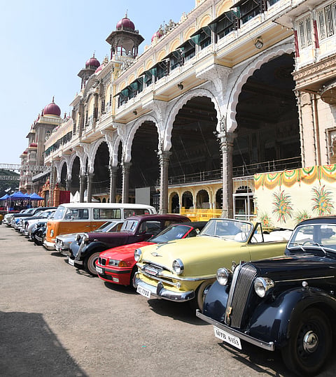 Vintage car exhibition in the palace courtyard.
