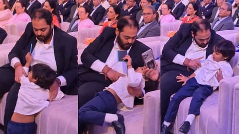 Anant Ambani playing with his nephew at a Jio event