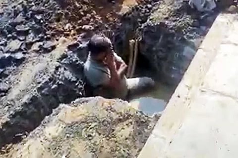 Man in Pit