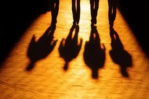 shadow four men