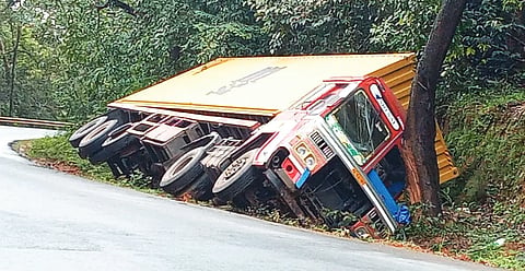 Lorry overturns after driver loses control