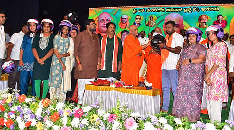 Helmet distribution program Mandya