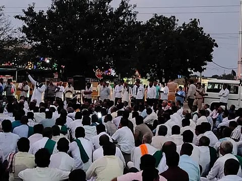 Farmers protest by blocking state highway