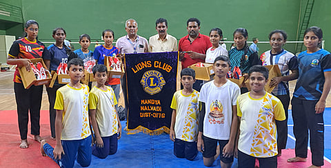 Lions distribute shoes to players Mandya