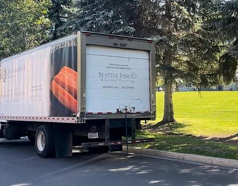 Seattle Fish & Lombardi Brothers Meats' delivery truck