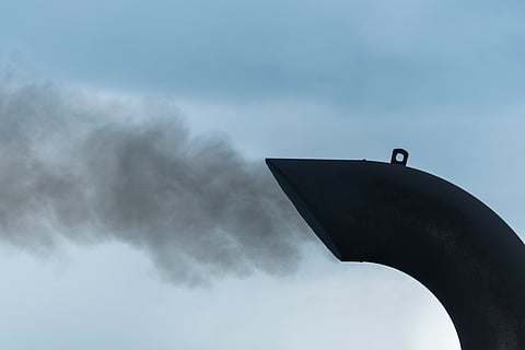 Smoke from ferry boat. Air pollution and ecology concept.