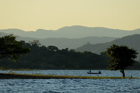 A fishing boat on Lake Kariba, the world's largest artificial lake, which lies on the border between Zambia and Zimbabwe.