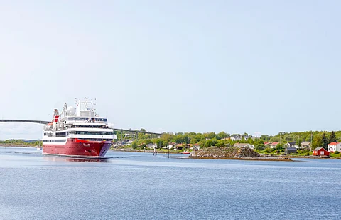 Passenger vessel EXPLORIS ONE sailing under the flag of the Bahamas.