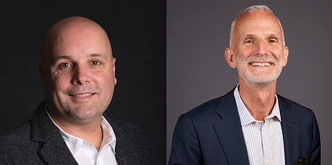 Rob Snyder and Eduardo Carbajosa, incoming and outgoing CEO of Acme Smoked Fish.