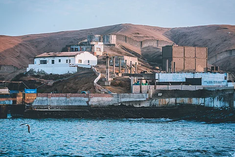 Fishmeal factory on the Pacific Ocean coast of Peru, early in the morning.