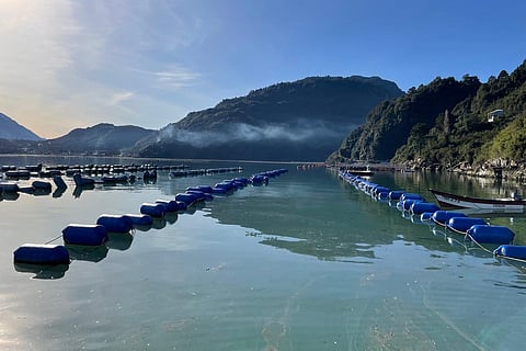 The book is titled 'The Aqua-Adapt Framework for Aquaculture Climate Change Adaptation.'