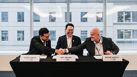 Vivek Kumar, CEO of WWF-Singapore, Lim Wey-Len, Executive Vice President of Singapore Economic Development Board (EDB) and Wayne Murphy, Co-Founder of Hatch Blue, at the official signing in New York during NYC Climate Week.