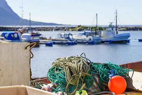 Old port fishing equipment on pier, Hovsund Norway
