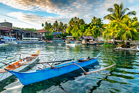Barabo town,river neighborhood scenes at sunset, Mindanao Island,Surigao del Sur district,The Philippines.
