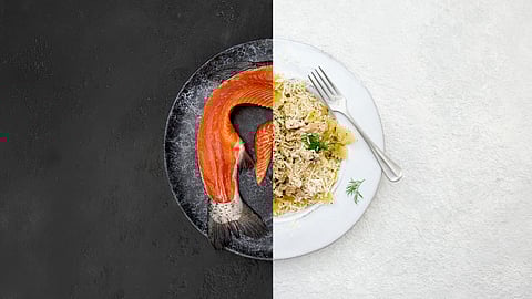 Plate with salmon filleting discarded parts on one half, and those parts converted into ready-to-use food items on the other half.