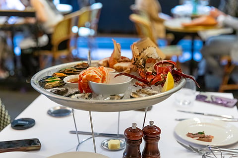 Seafood platter with prawns, shrimp, crabs, Balmain bugs, oyster clams in a Sydney CBD restaurant, NSW, Australia.