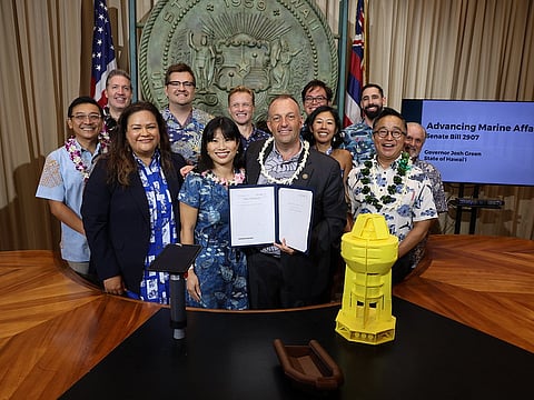 Governor Josh Green and participants with the newly-signed blue economy legislation.