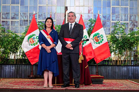Peru's new Minister of Production, Juan Carlos Requejo, poses next to the country's President, Keiko Fujimori.
