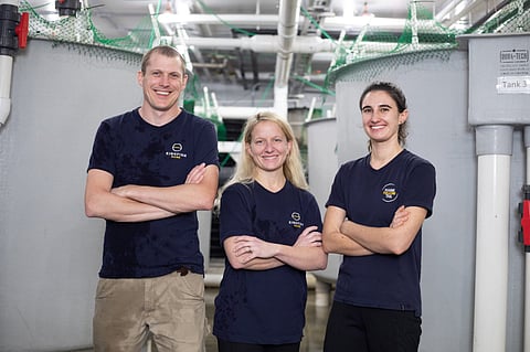 Team Kingfish Maine. Left to right, Operations Manager Tom Sorby, Head of Operations Megan Sorby, and Hatchery Technician Liz Groover (not pictured, Tom Reynolds). Photo: Kingfish Maine / The Kingfish Company.