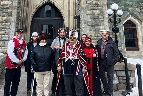 Chiefs and leaders of the Coalition of First Nations for Finfish Stewardship in Parliament Hill, Ottawa, Canada, defending salmon farming. Photo: First Nations for Finfish Stewardship.