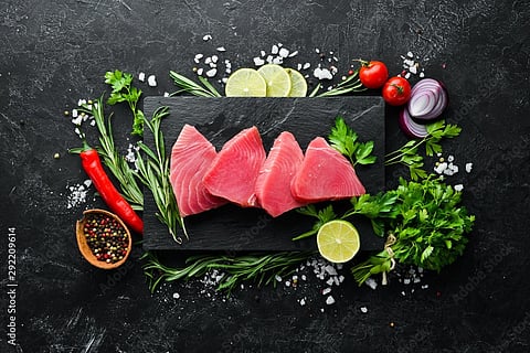 Raw tuna fillet. Photo by: Adobe Stock.