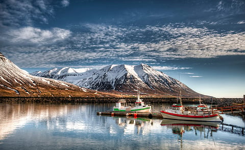 Olafsfjordur is a city in northwestern Iceland, located at the mouth of the Eyjafjorour fjord. Photo by: Adobe Stock.