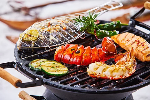 A survey reveals there will be more fish at the 4th of July BBQs in the United States. Seafood is one of the top choices of consumers willing to switch from beef to improve their environmental impact. Photo: Adobe Stock.
