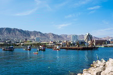 Fishing boats in the harbor at Antofagasta, the capital of one of the regions affected by the El Niño phenomenon for which Chile is getting ready. Photo: Adobe Stock.
