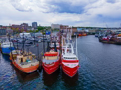 Fishing boats at New Bedford harbor, Massachusetts. Photo: Adobe Stock.
