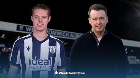 Carter Pinnington in a West Brom shirt with Technical Director Dominic Price next to him.
