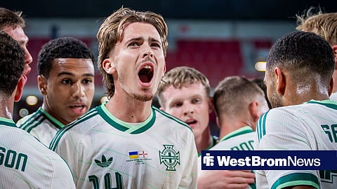 Isaac Price celebrates scoring for Northern Ireland against Ukraine.